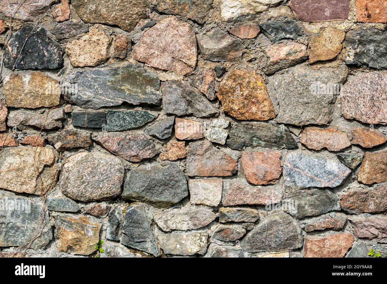 Old stone masonry. Stone wall of the old historic building Stock Photo -  Alamy