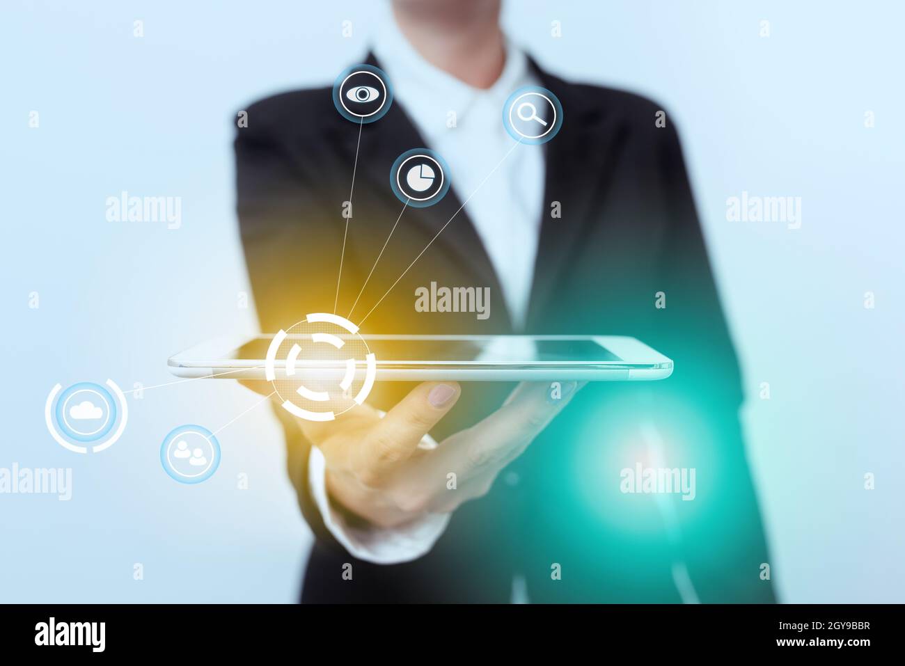 Lady In Suit Presenting Mobile Device With Futuristic Interface Tech. Stock Photo