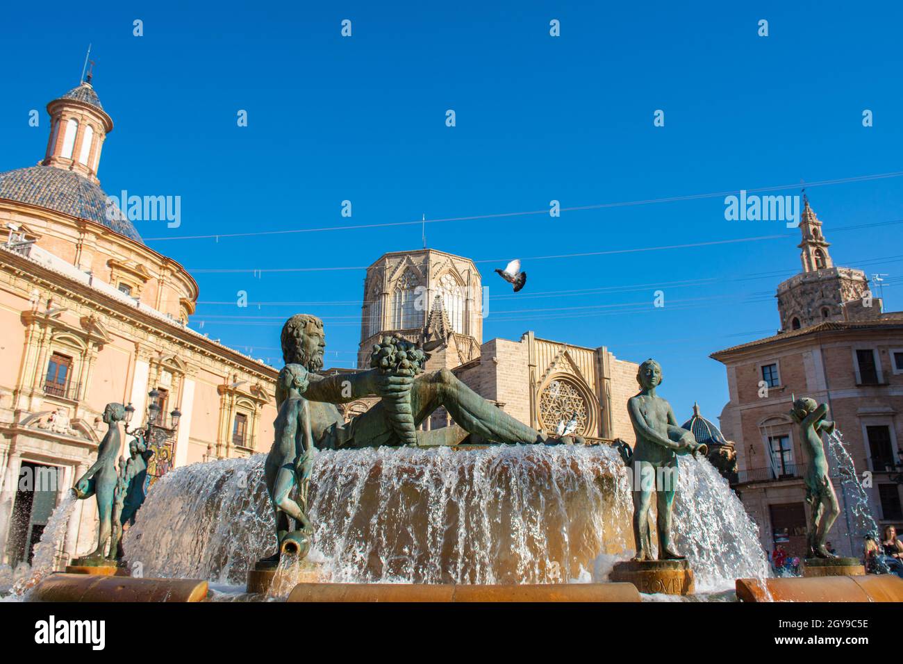 Valencia, Spain. July 7, 2021 Square with the fountain, the basilica
