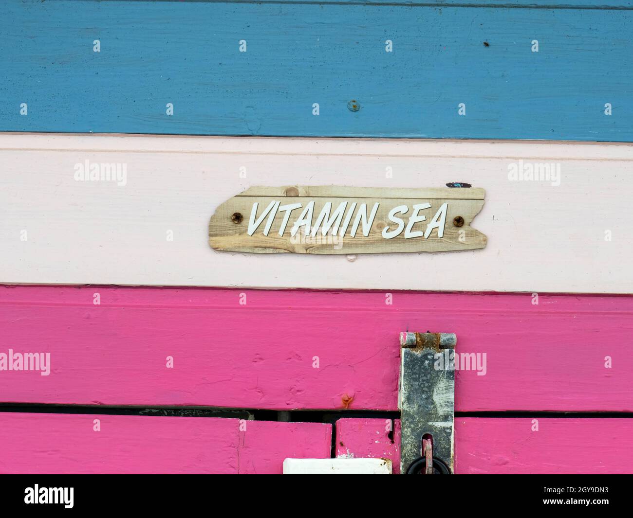 Funny names for beach huts in sheringham, norfolk, UK Stock Photo Alamy