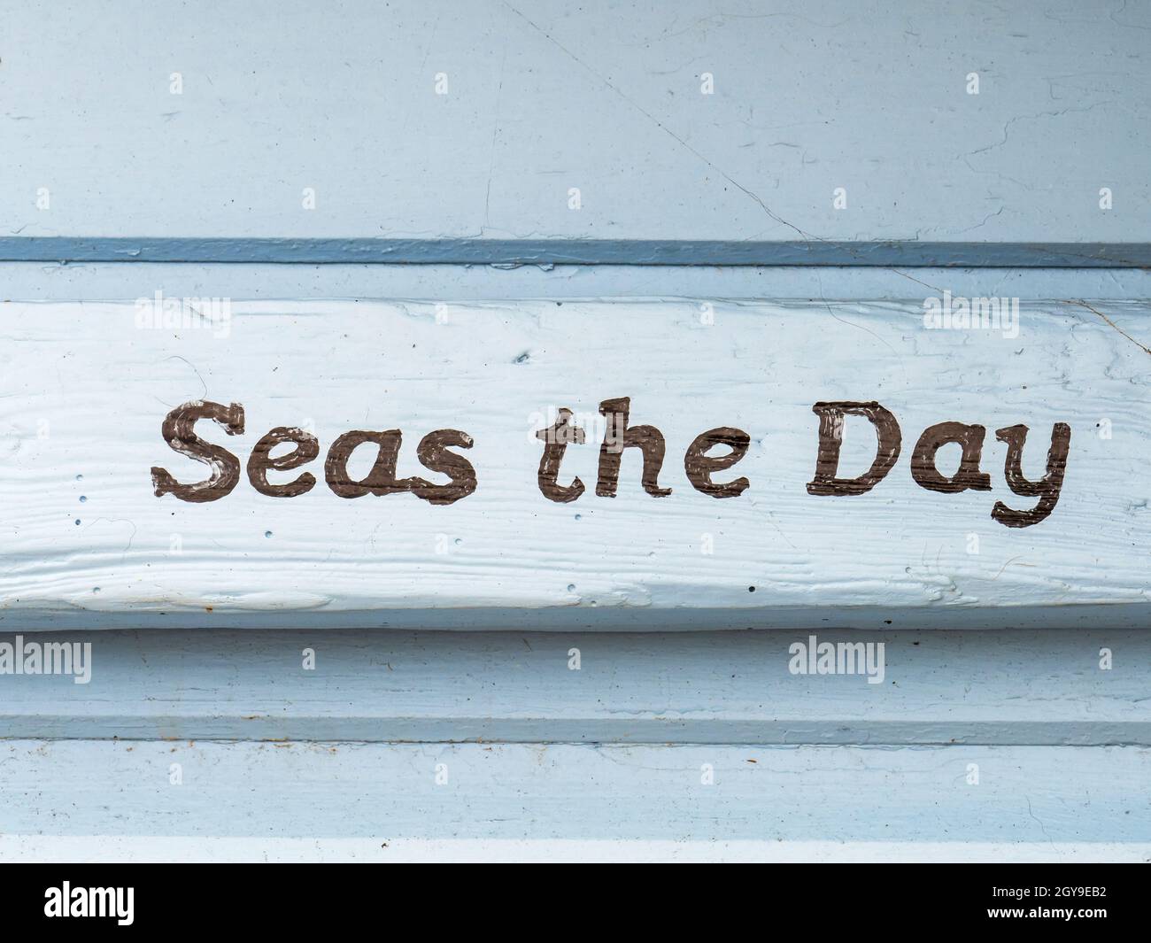 Funny names for beach huts in sheringham, norfolk, UK Stock Photo Alamy