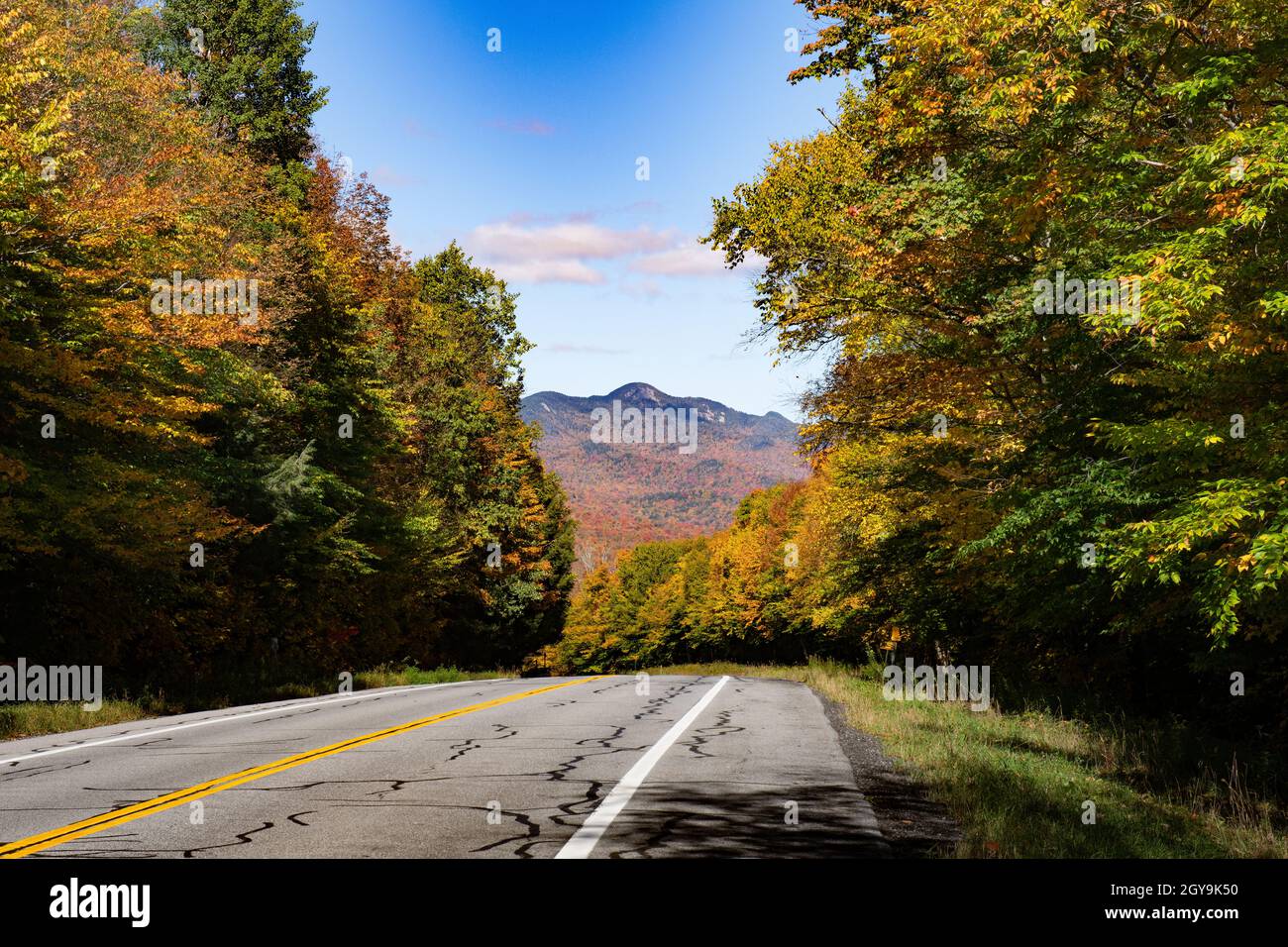 A view of Snowy Mountain in the Adirondacks in autumn from NYS Route 30 highway. Stock Photo