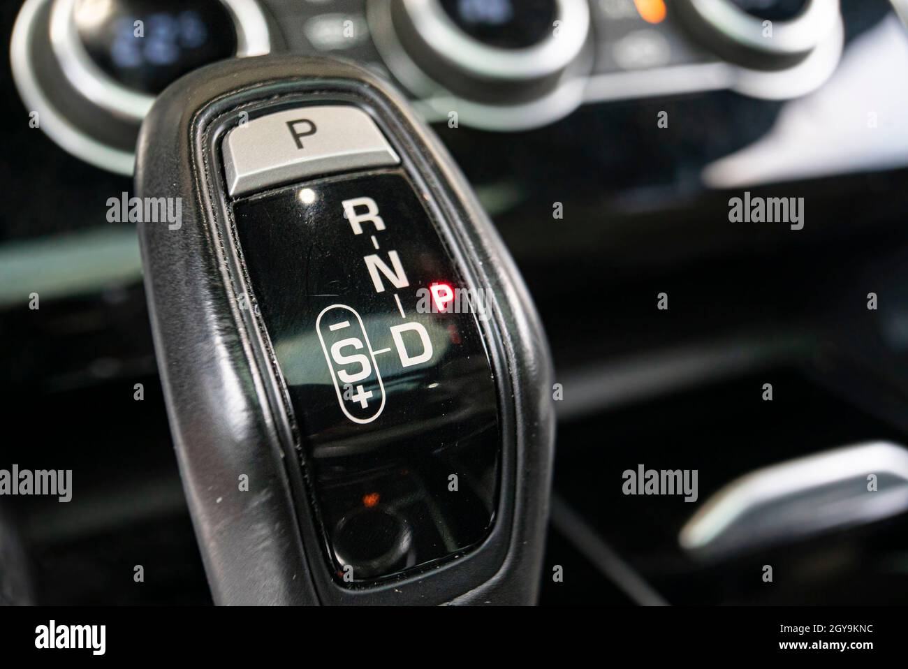 Automatic gearshift lever detail macro shot with selective focus Stock Photo