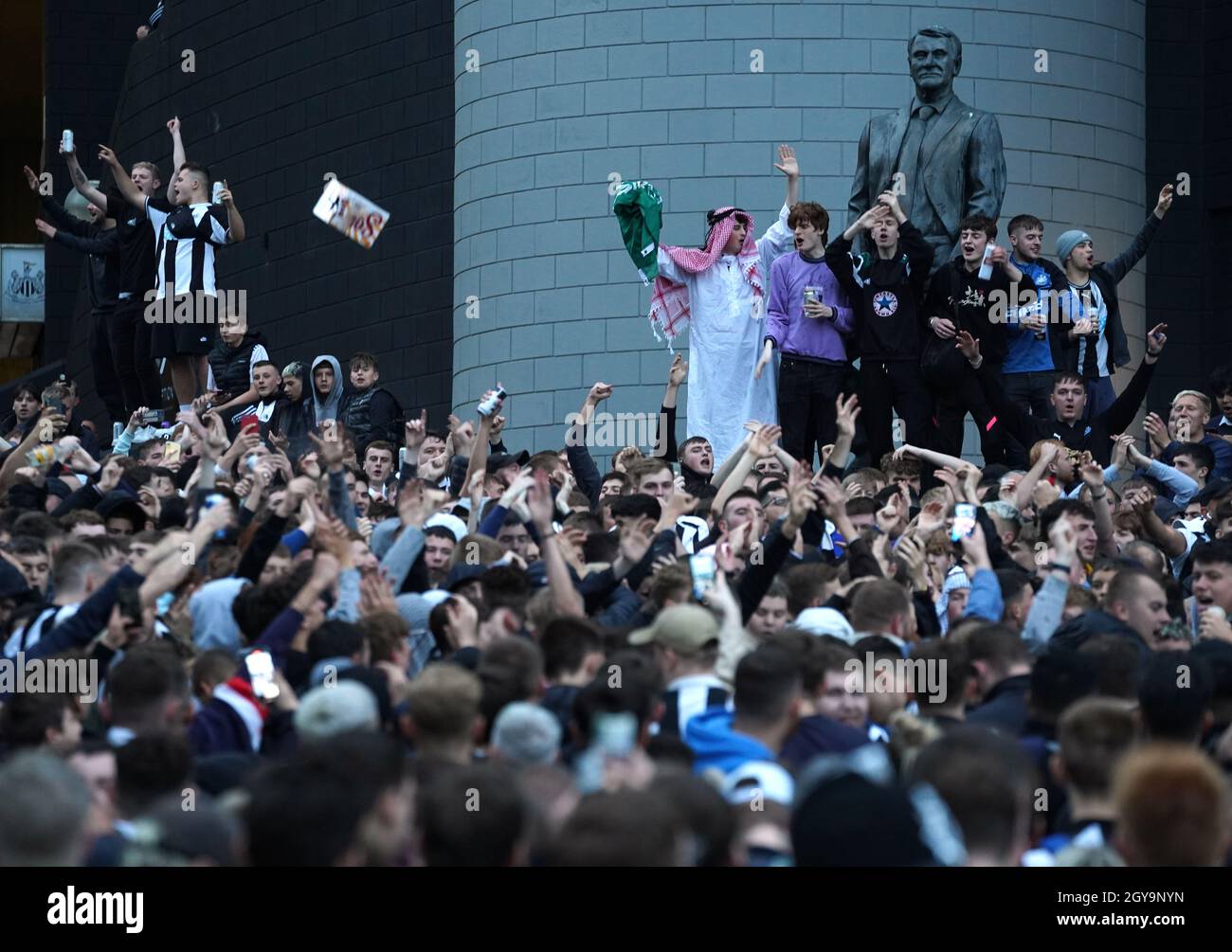 newcastle-united-fans-celebrate-at-st-james-park-following-the