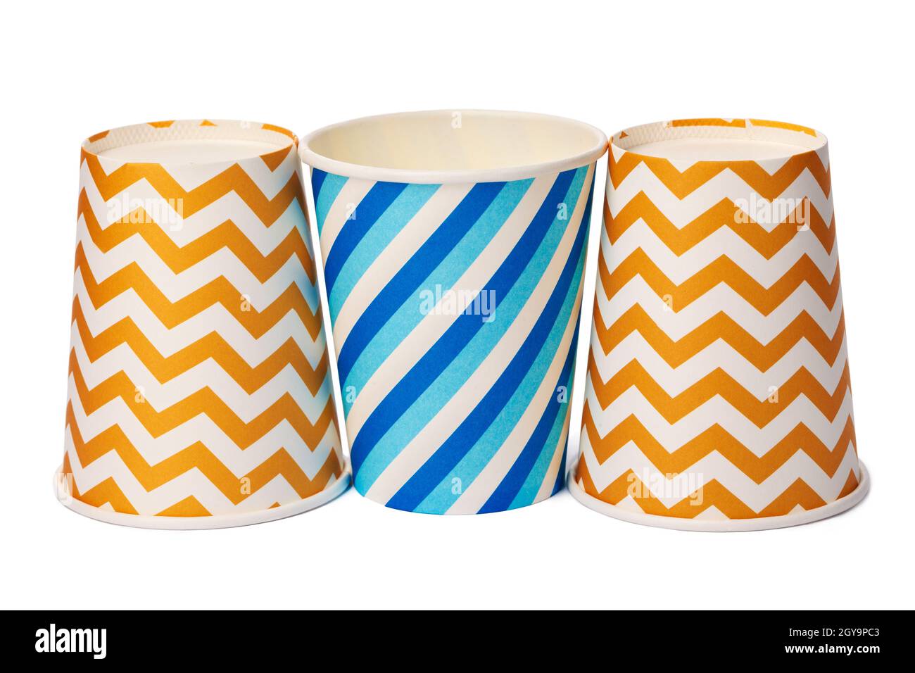 Paper disposable cups with colored pattern isolated on white background ...