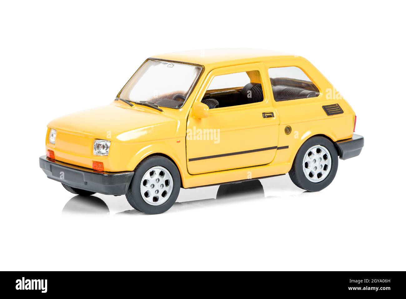Vintage yellow toy car isolated on white background with clipping path Stock Photo
