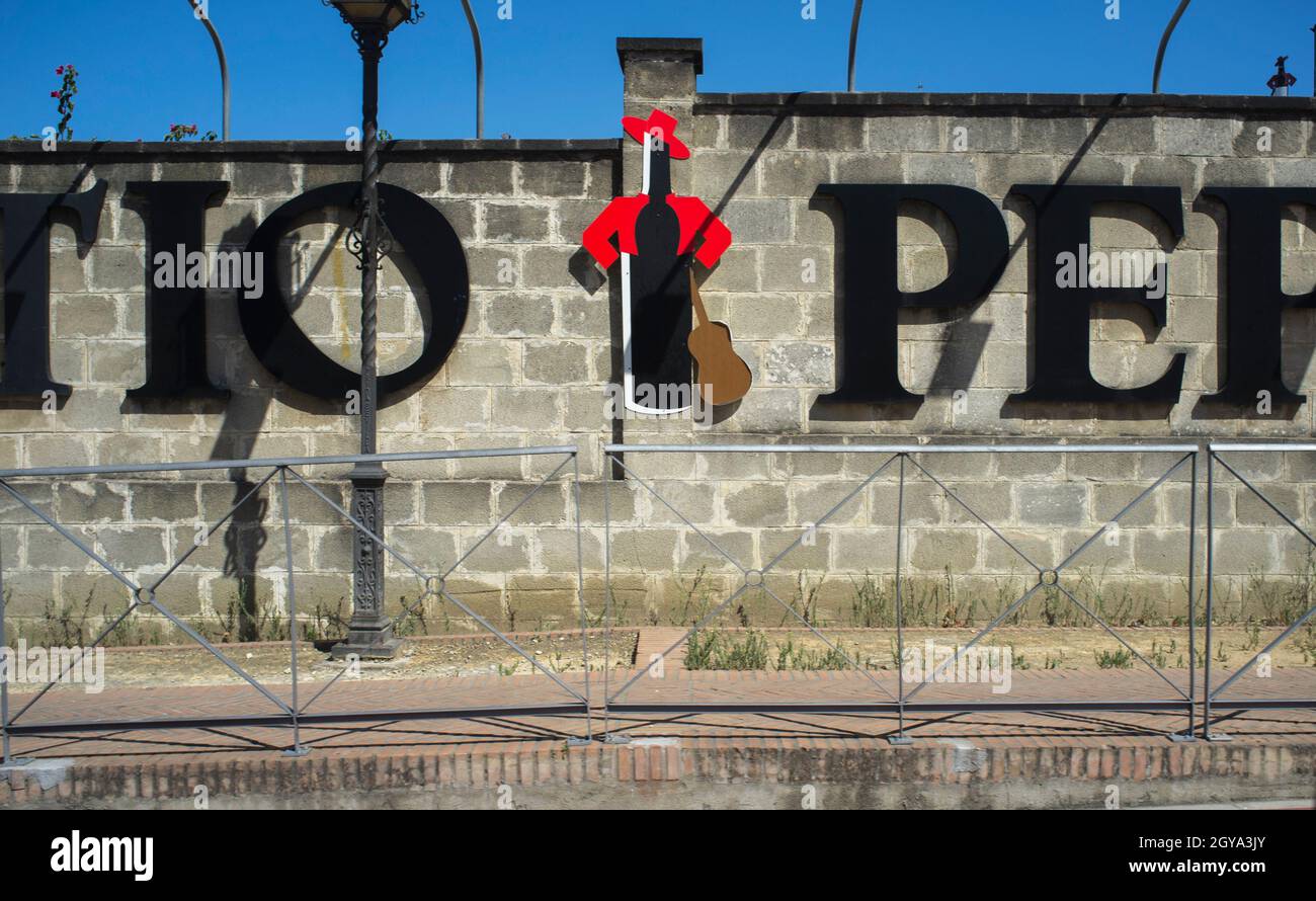 Jerez de la Frontera, Spain - June 1st, 2019: Large Tio Pepe bottle logo attached to Gonzales Byass Bodega, Jerez de la Frontera, Spain Stock Photo