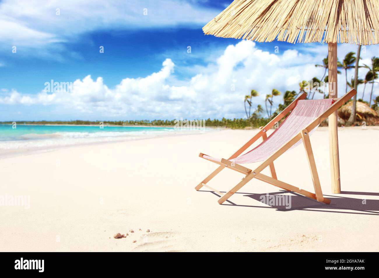 Wooden deck chairs on sandy beach near sea. Holiday background Stock ...