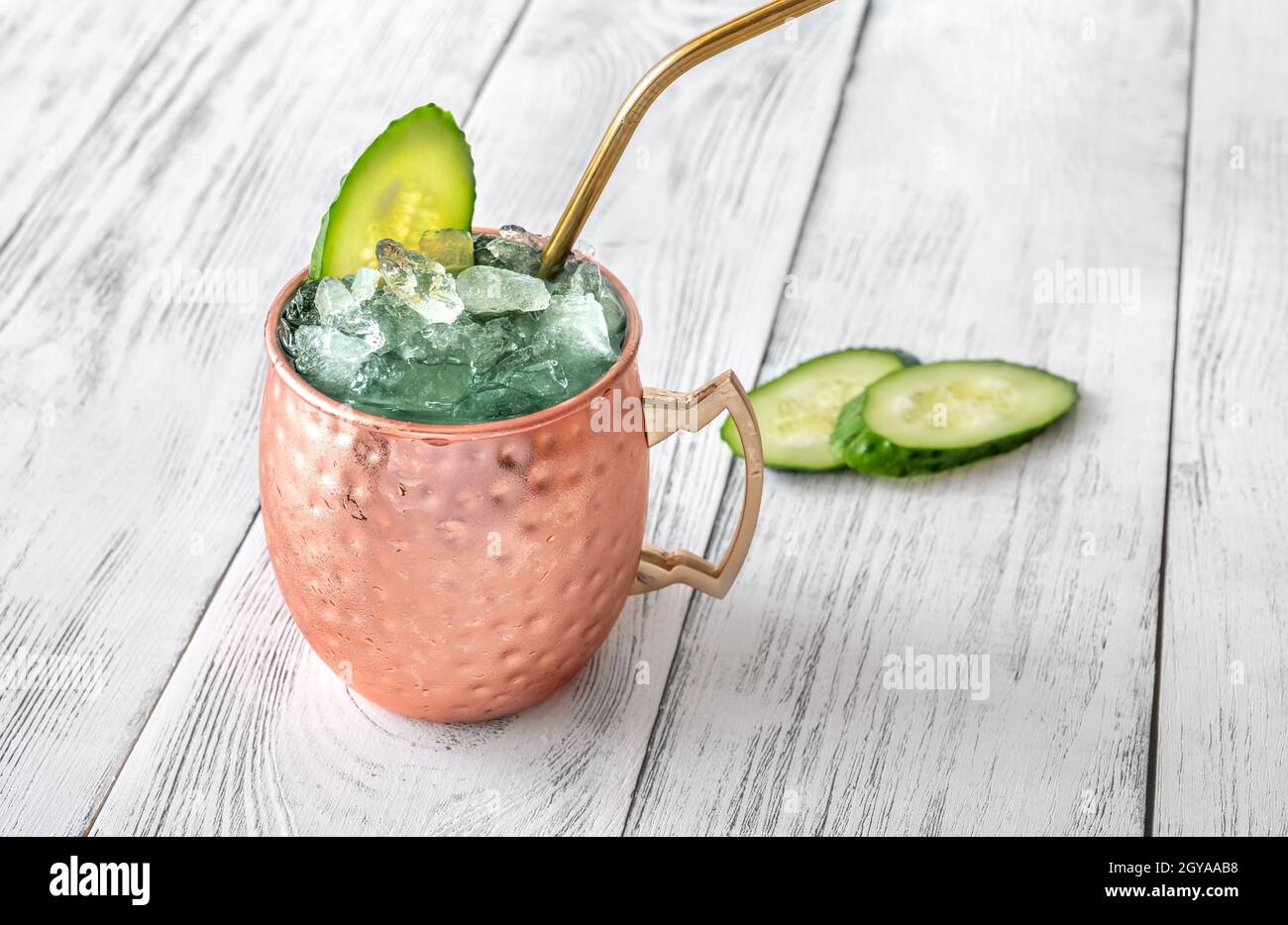 Mug of Sober Mule mocktail garnished with cucumber Stock Photo