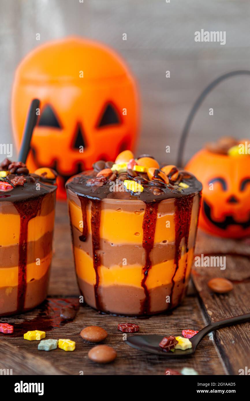 Colorful pudding dessert with sugar sprinkles for Halloween Stock Photo