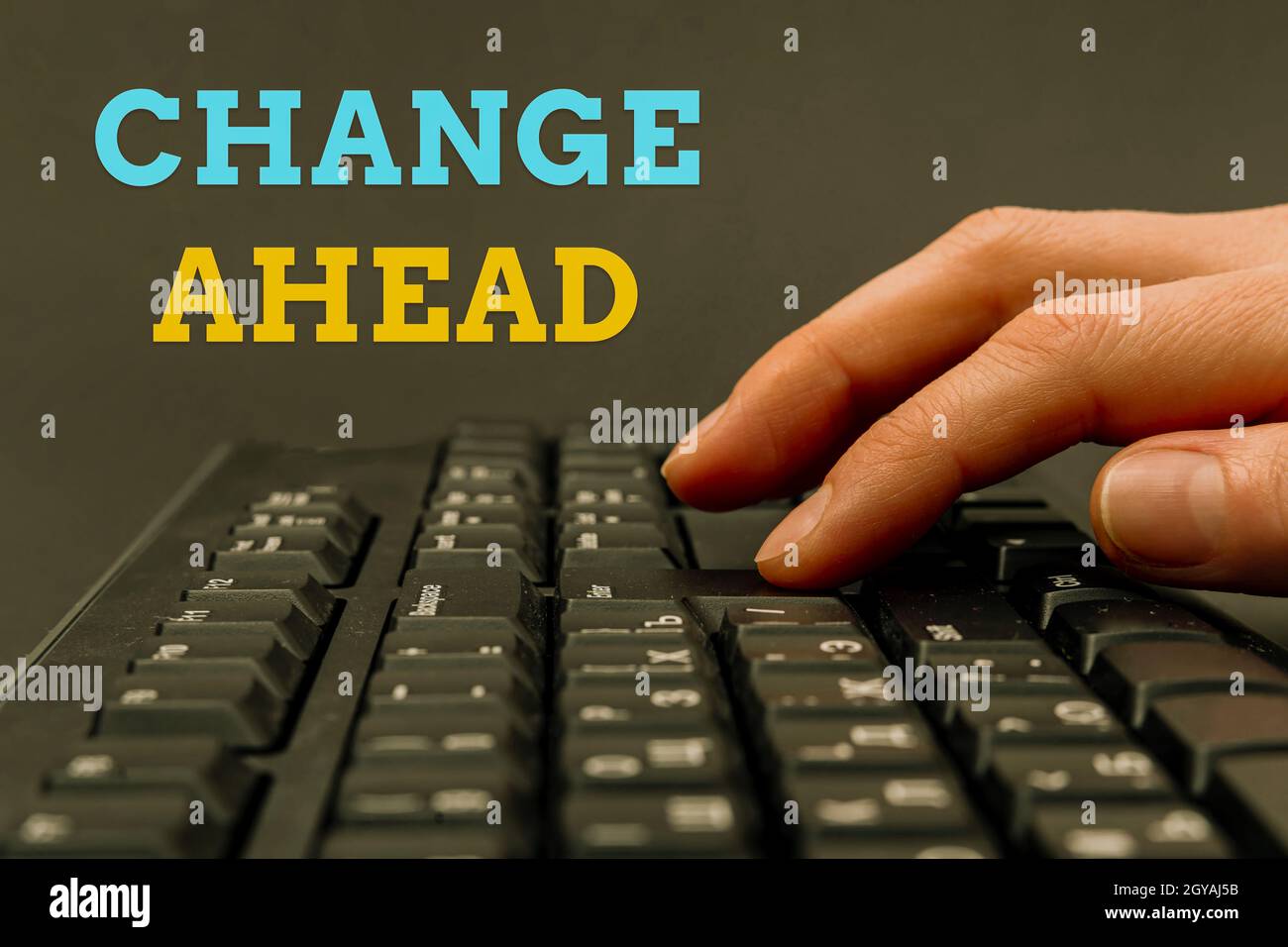 Conceptual display Change Ahead, Concept meaning Some alterations waiting to happen Perspective Standby Hands Pointing Pressing Computer Keyboard Keys Stock Photo