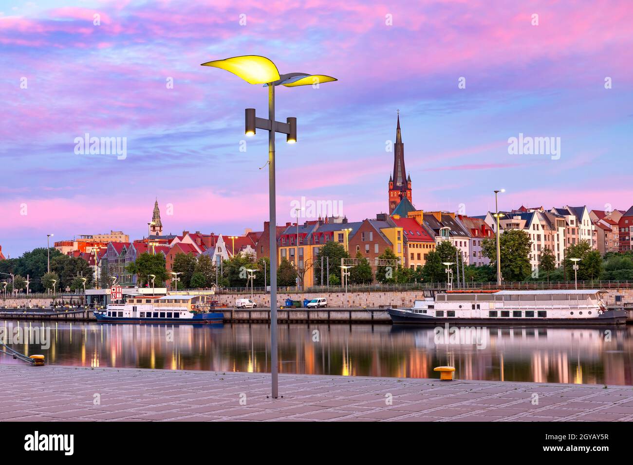 Panorama of Cathedral, Old Town and river Oder at sunset, Szczecin, Poland Stock Photo