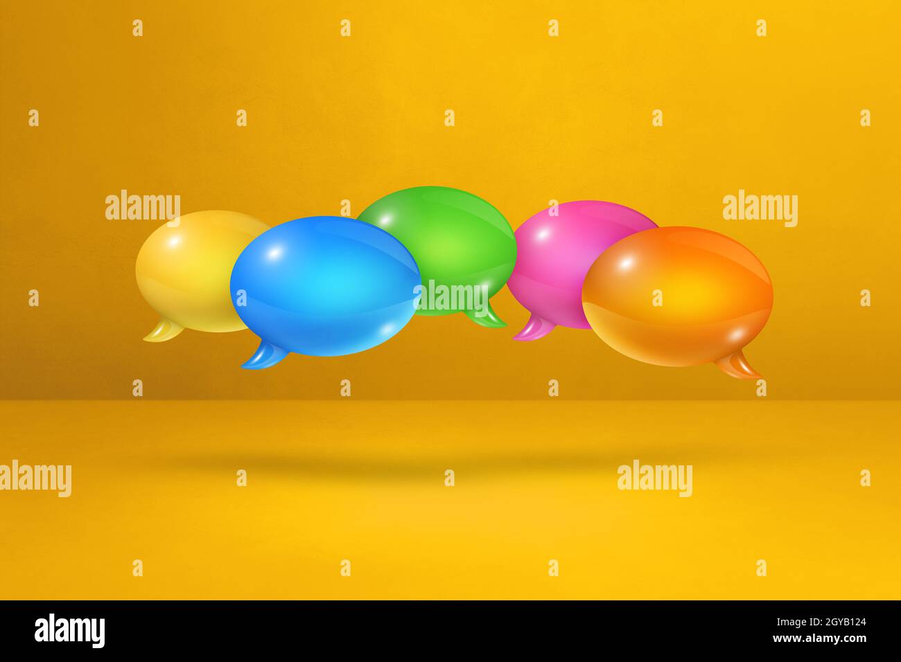 3D multicolor speech bubbles isolated on yellow background Stock Photo