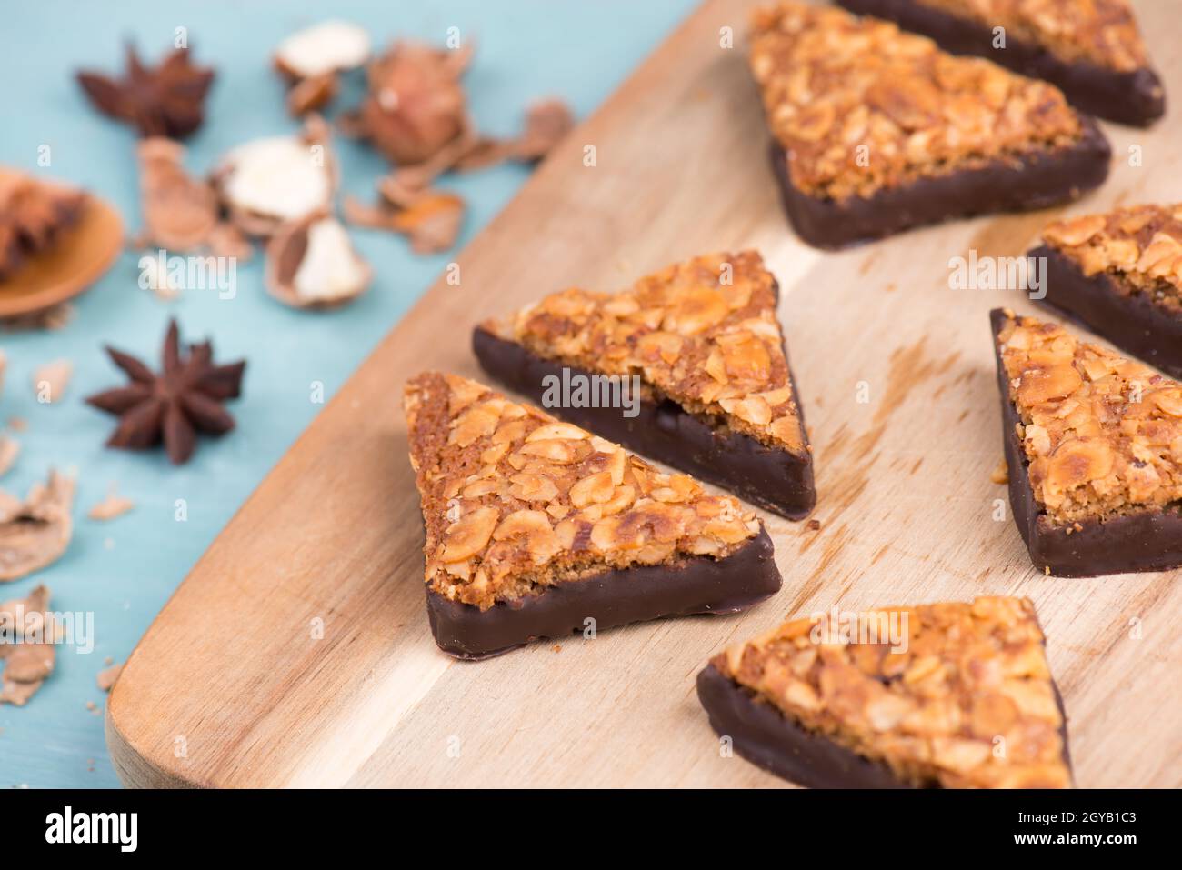 Nut corner, traditional german sweets called Nussecke, covered with chocolate, christmas baking