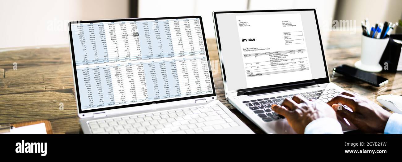 Tax Account Invoice Spreadsheet Report On Computer Monitor Stock Photo