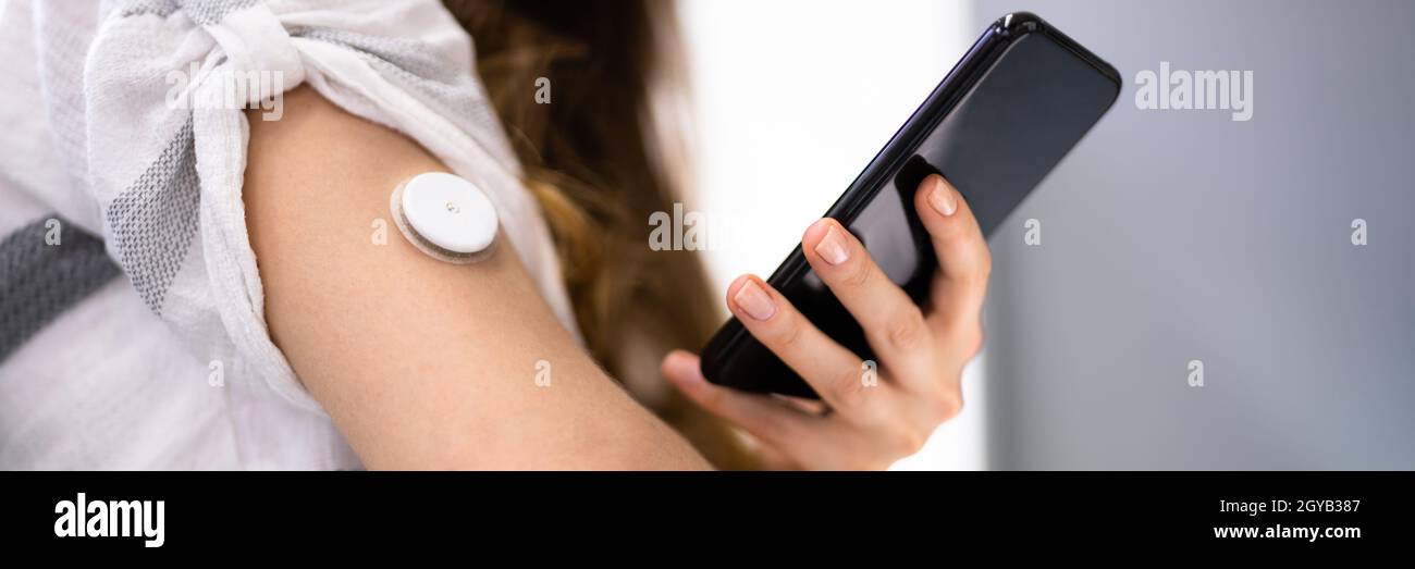 Continuous Glucose Monitor Blood Sugar Test Smart Phone App Stock Photo