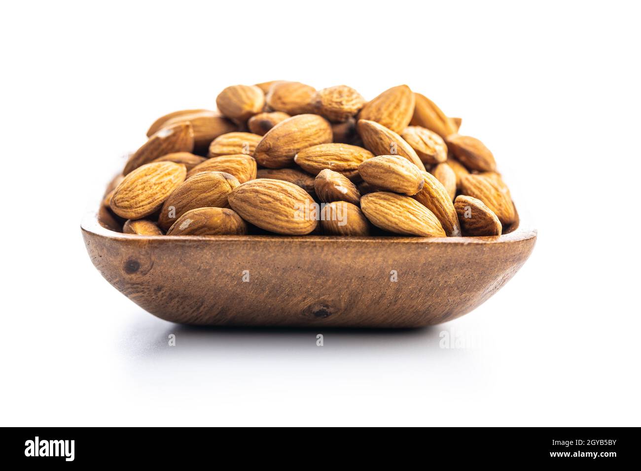 Peeled almonds nuts isolated on white background. Stock Photo