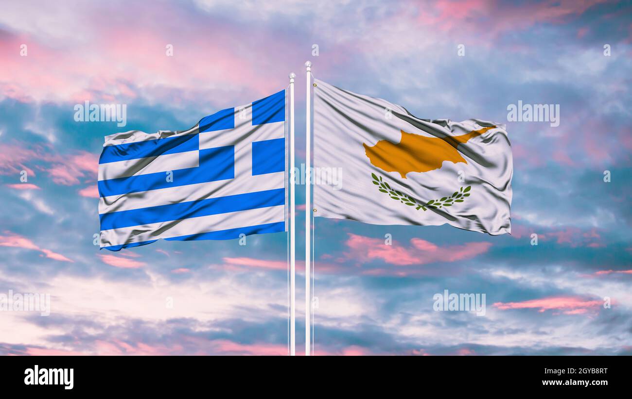 Greece and Cyprus two flags on flagpoles and blue sky Stock Photo