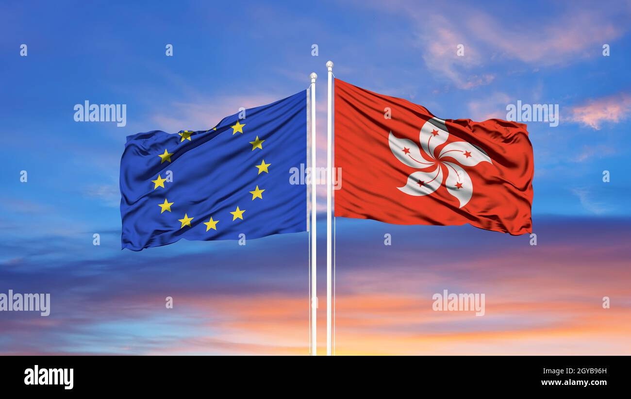 European Union and Hong Kong two flags on flagpoles and blue cloudy sky Stock Photo