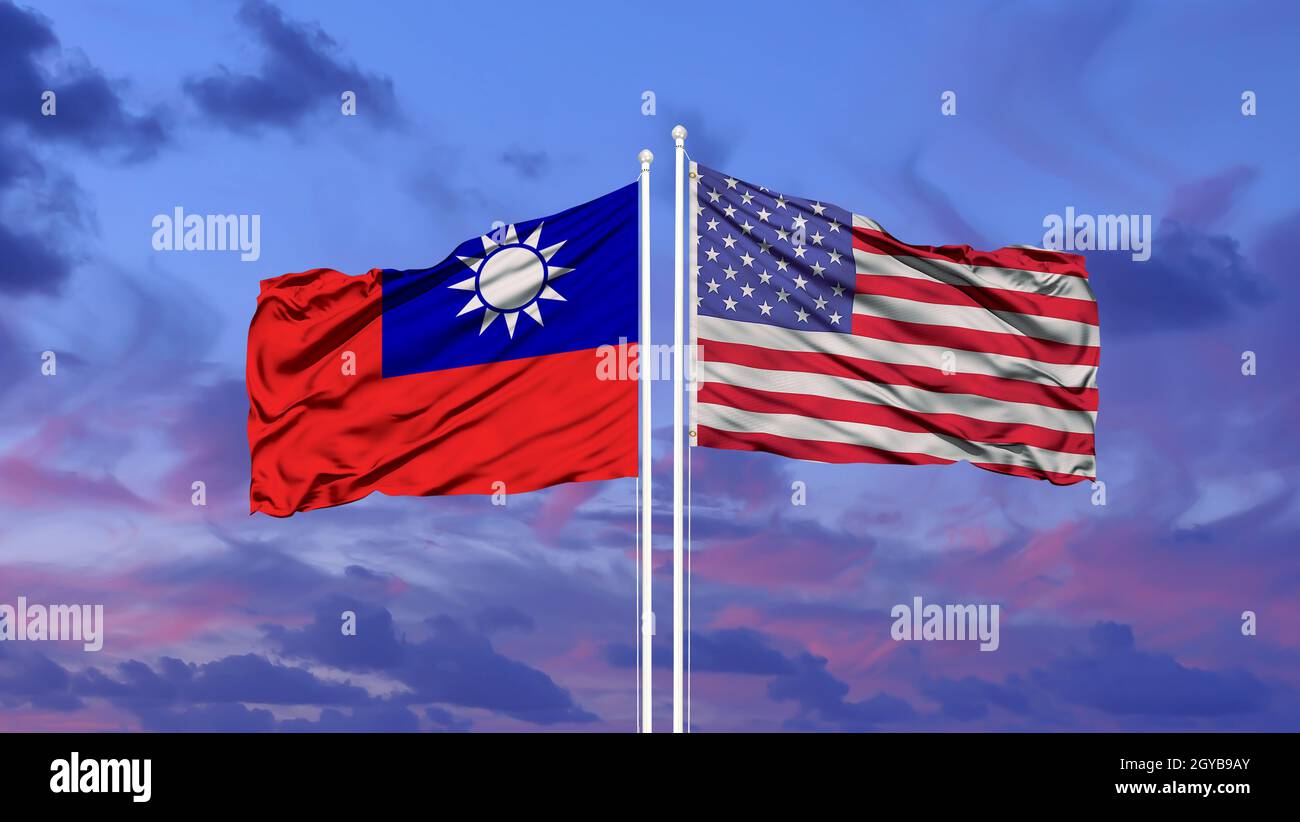 Taiwan and United States two flags on flagpoles and blue sky Stock Photo