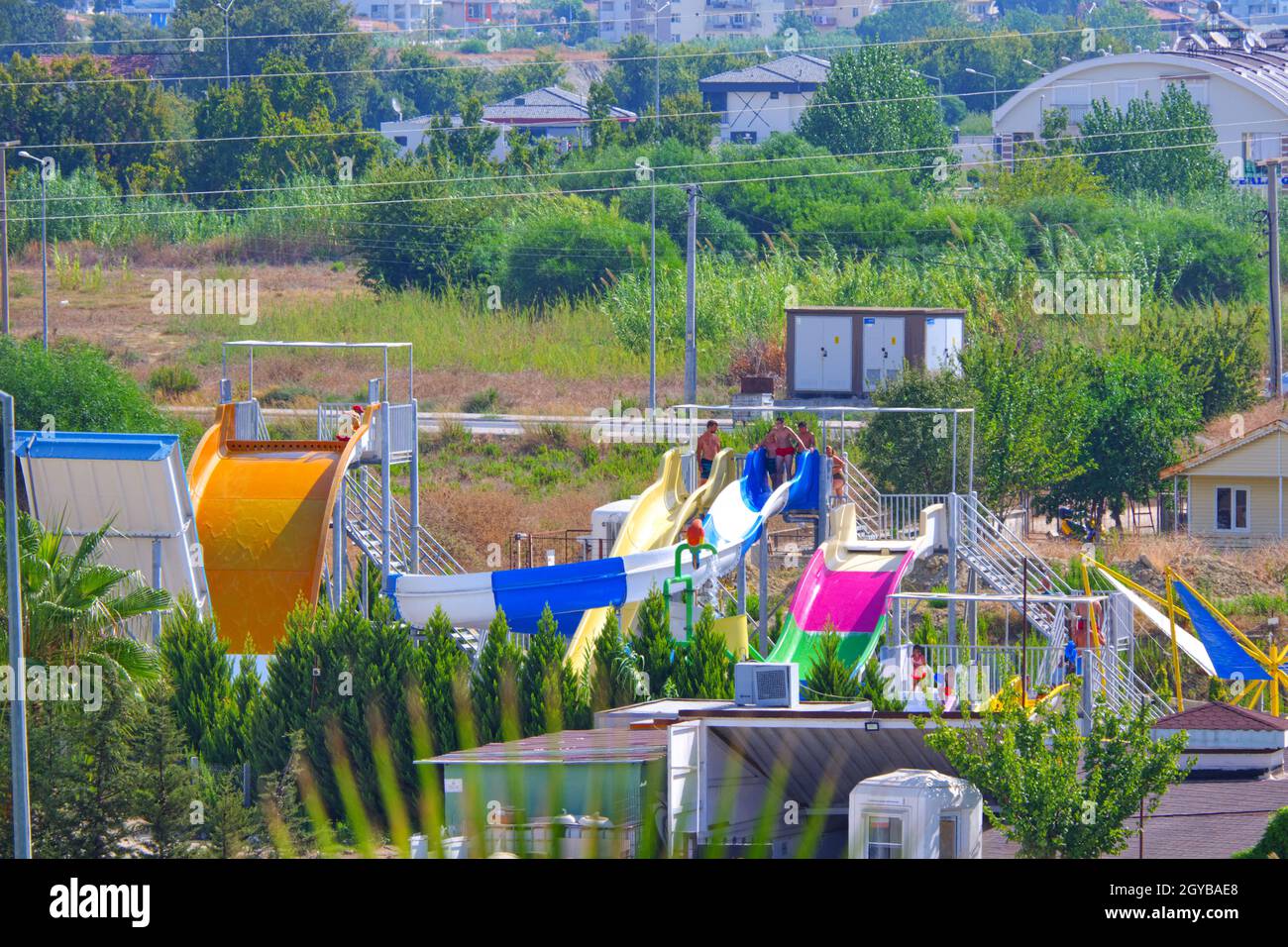 Colorful slides and toys of small aqua-park of a small building complex in Antalya Stock Photo