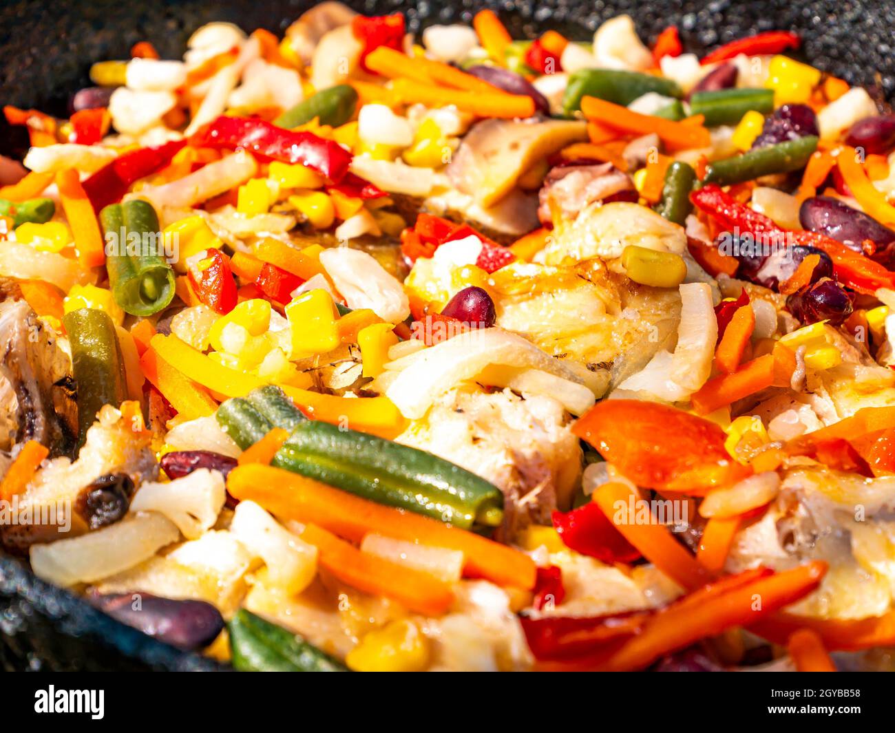 Culinary dish fried fish with vegetable stew. Food photo. Fish