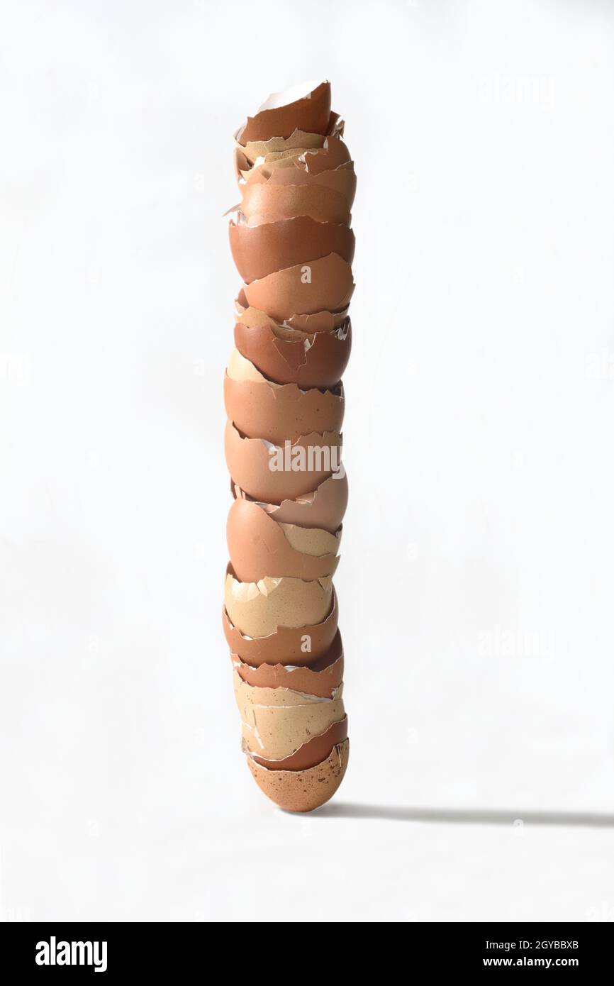 egg shells piled up on white background Stock Photo