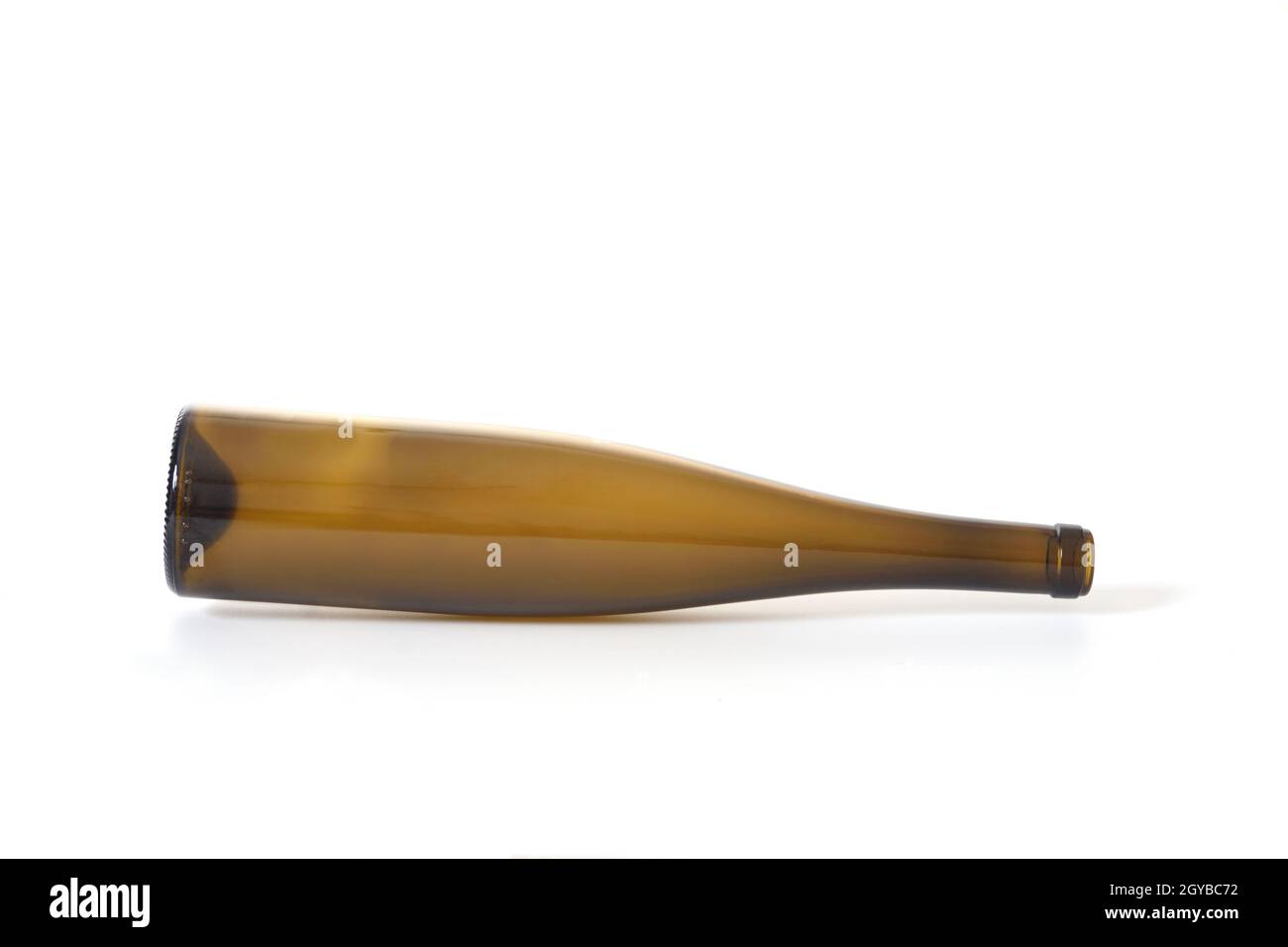 brown glass bottle lying on white background Stock Photo