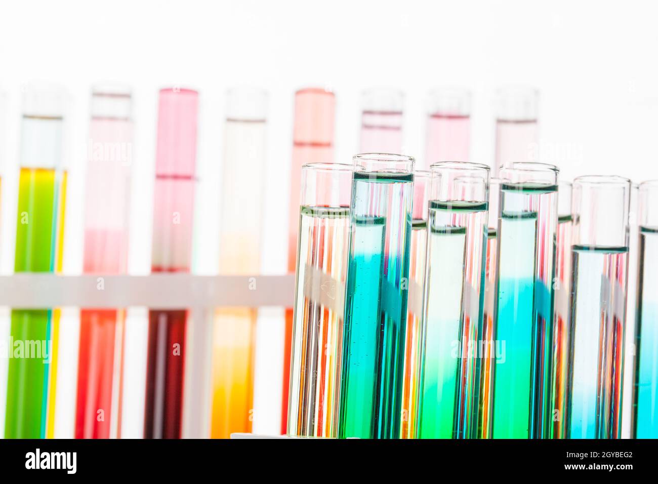 Glass laboratory chemical test tubes with liquid for analysis close up ...