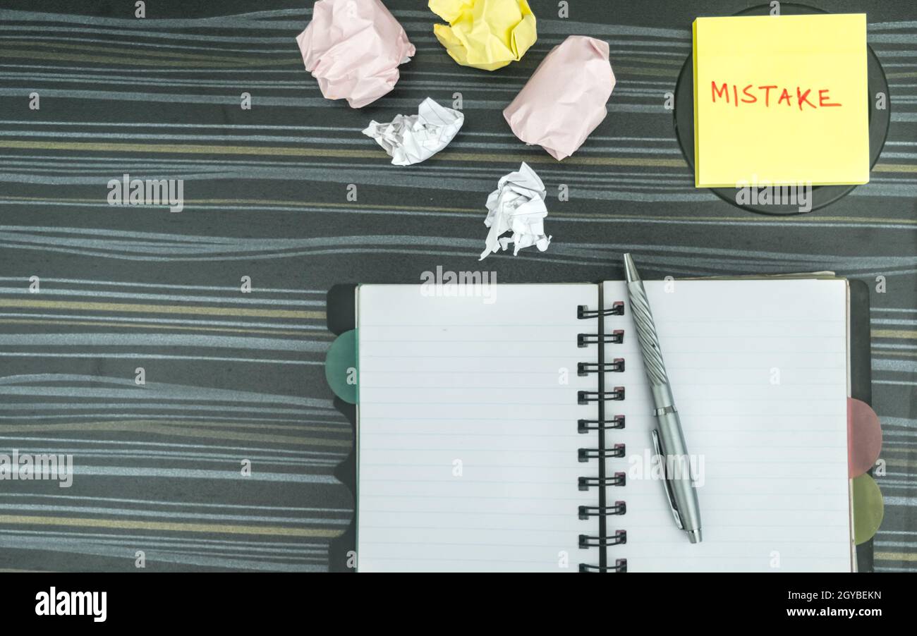 Mistake written on sticky notes. Learning, wrong, blooper, error