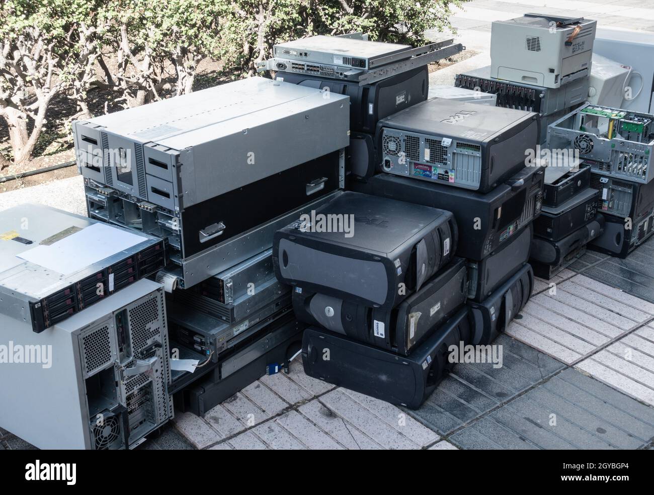 Computers for recycling in street outside offices. Stock Photo