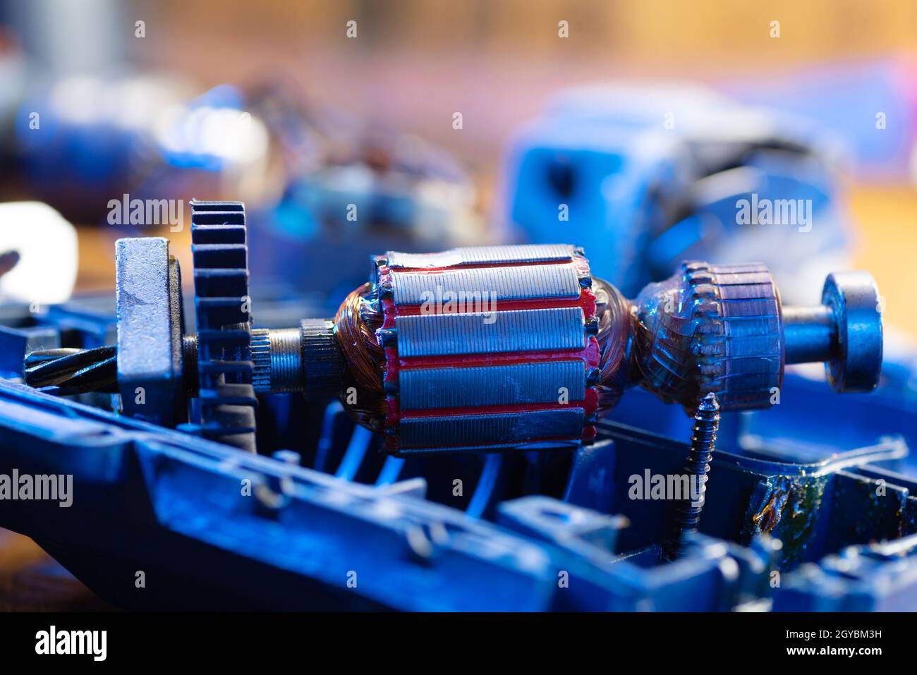 Power tool repair. Disassembled drill. Broken drill metal detail Stock