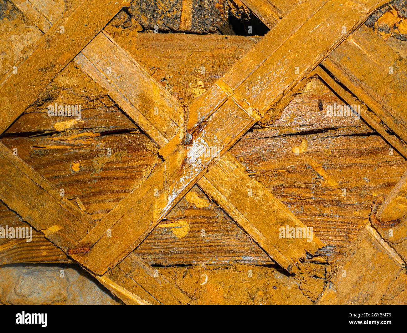 Texture of old wooden plaster walls of the building. Background image. Place for text. Template. Poster. Building sector. Construction and repair. Ret Stock Photo