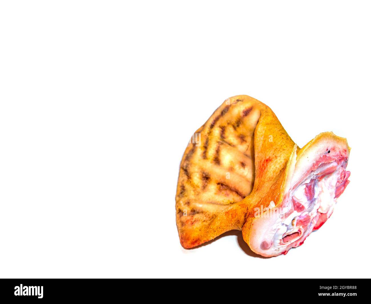 Meat pork ears on a white background. Pig ears. Pig hearing. Butcher