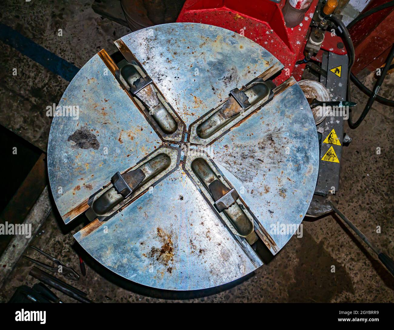 Tire changer for repair and maintenance of car wheels. Tire fitting of wheel tires. Car repair