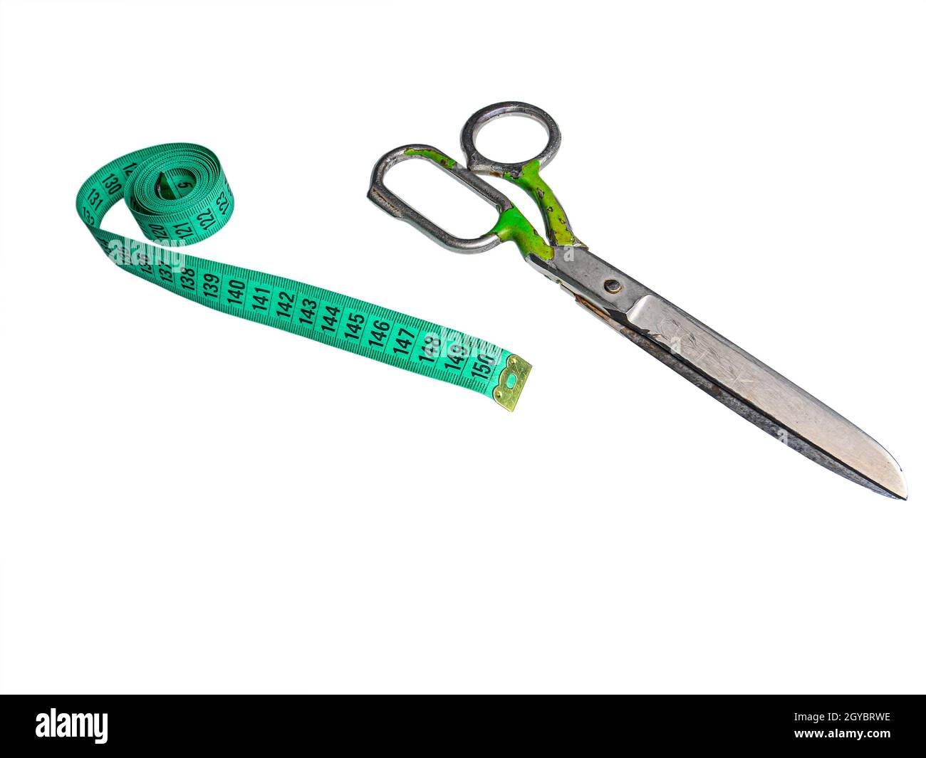 Tailors hand tool for tailoring scissors and centimeter. Centimeter gauge. Meter ruler. Measurement of the size of the clothes. Tailor's tool. Clothin Stock Photo