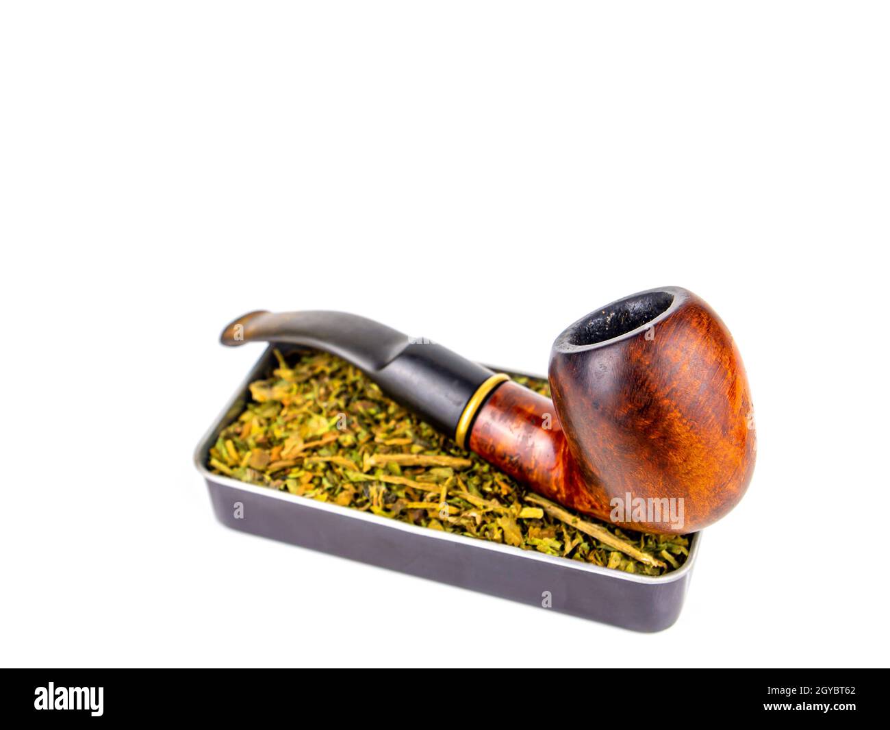 Tobacco pipe and snuff box on a white background. Wooden pipe for