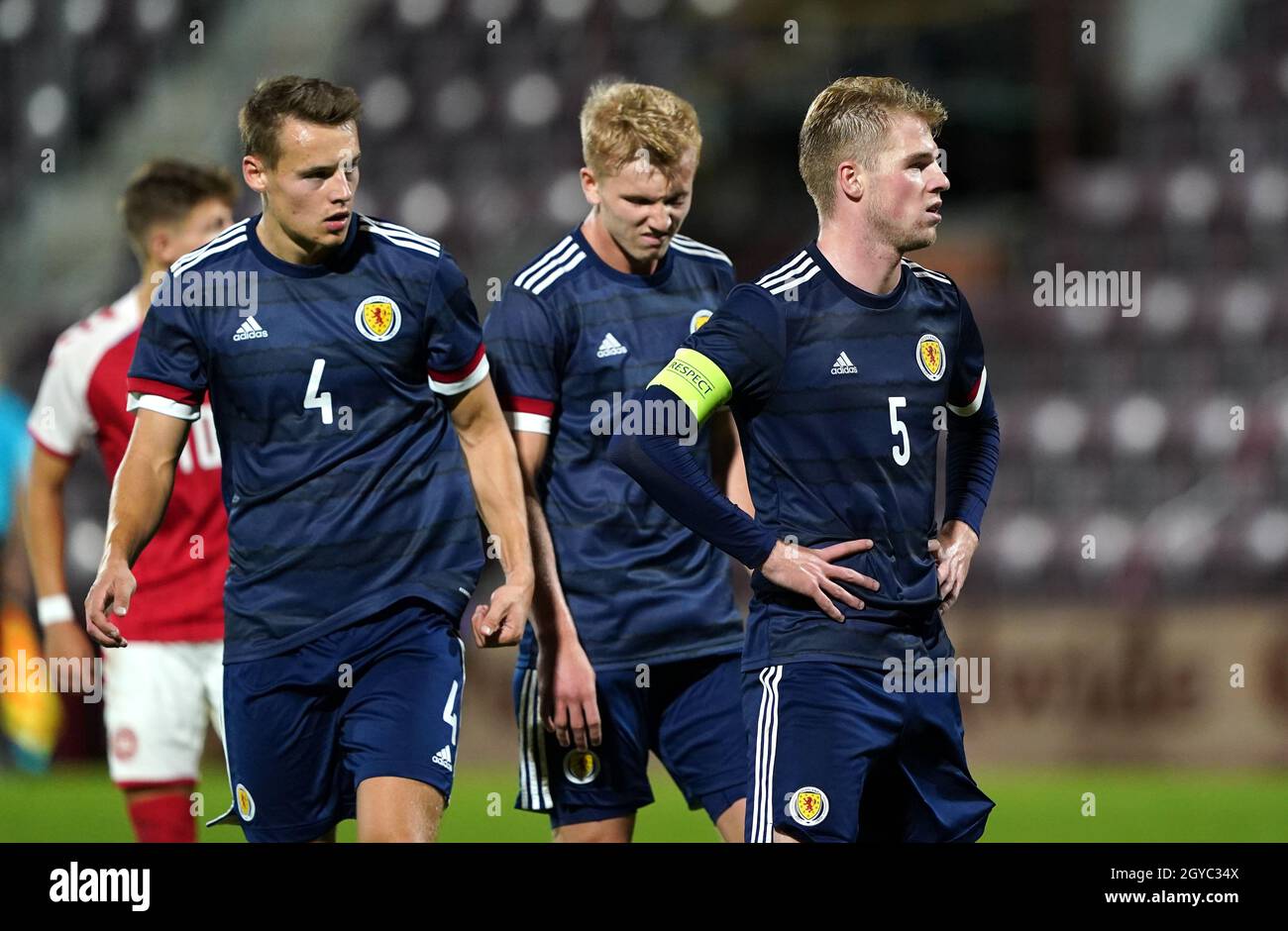 Scotland's Stephen Welsh (right) and Lewis Mayo (left) react after the UEFA Under-21 Championship Qualifying Round Group I match at Tynecastle Park, Edinburgh. Picture date: Thursday, October 7, 2021. Stock Photo