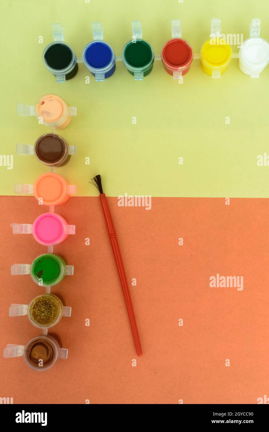 Colors art background. Watercolor paints and paintbrush. knolling concept. Stock Photo