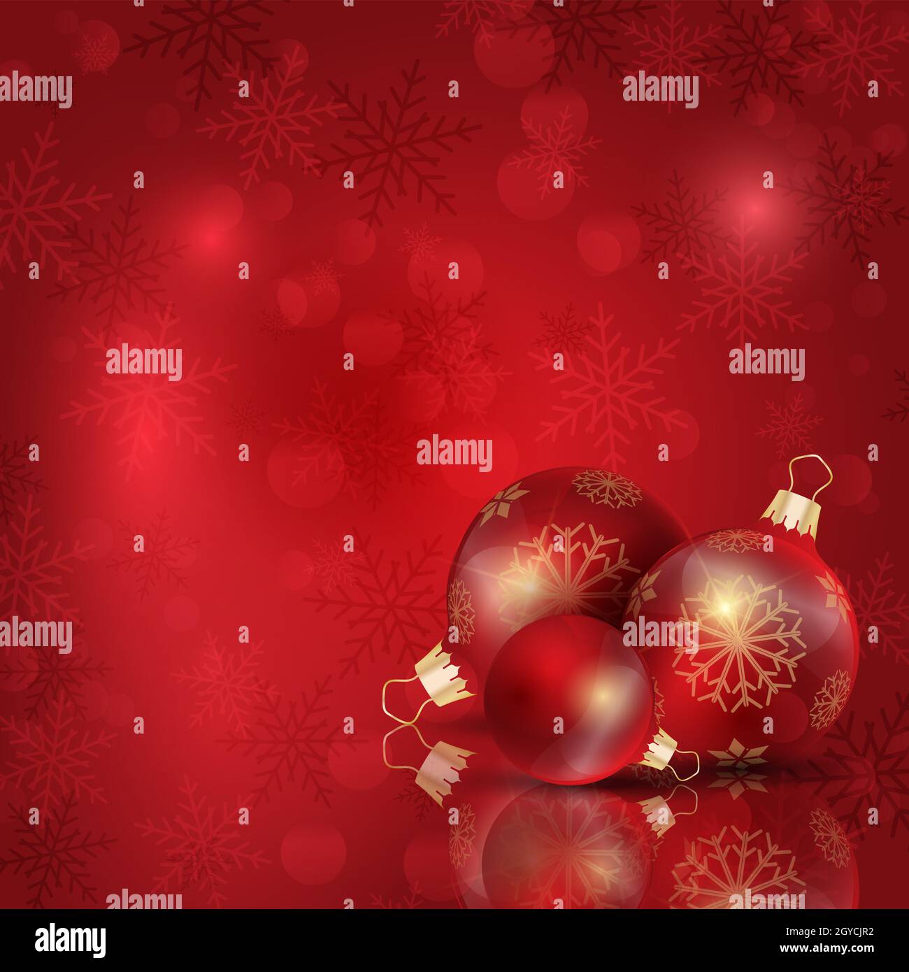 Christmas baubles on a snowflake background Stock Photo - Alamy