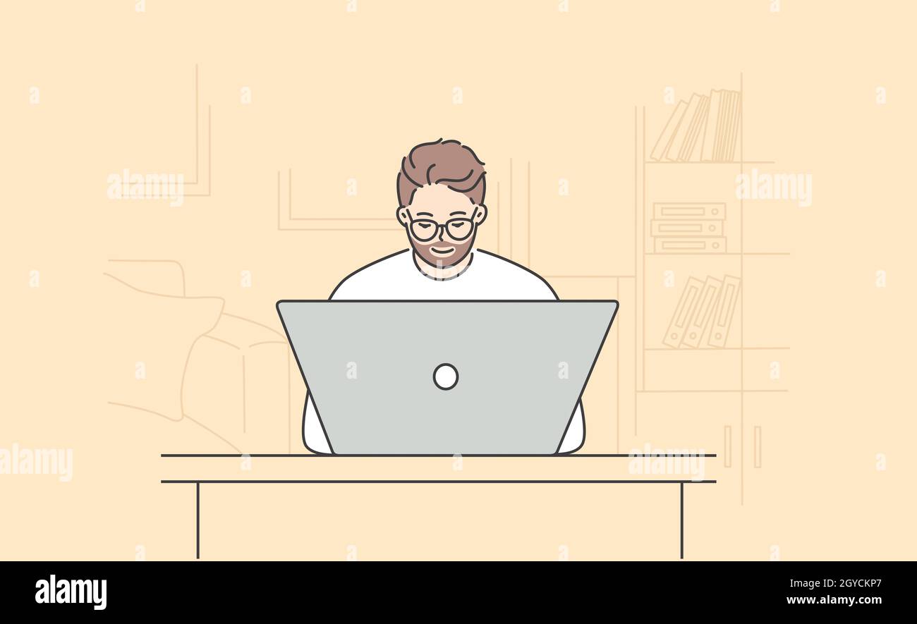 Modern technologies and working in office concept. Young positive bearded man cartoon character in glasses sitting and working on laptop at home or in Stock Photo