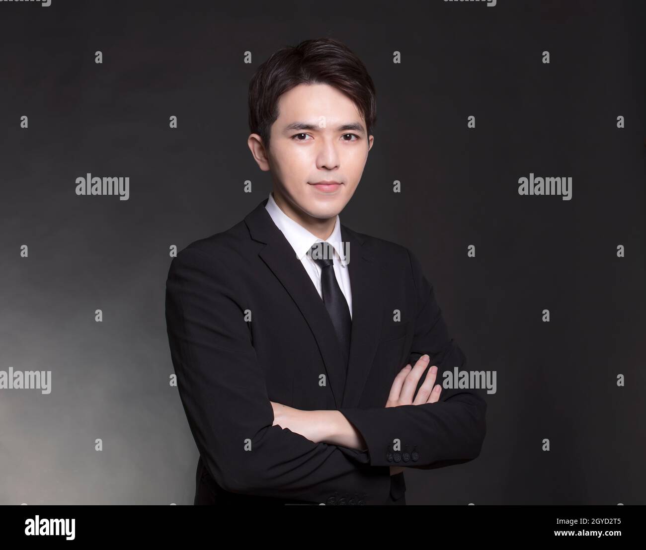 Young Asian handsome Business man in black suit Stock Photo - Alamy