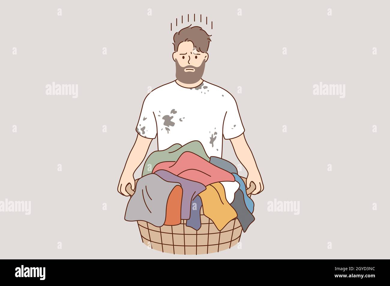 Laundry and washing clothes concept. Young frustrated stressed man cartoon character standing and holding basket with dirty colorful clothes for laund Stock Photo