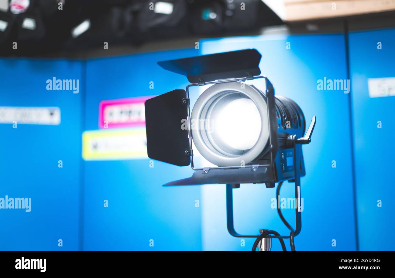 Professional studio spotlight in a TV studio. Lighting equipment for photography or videography. Stock Photo