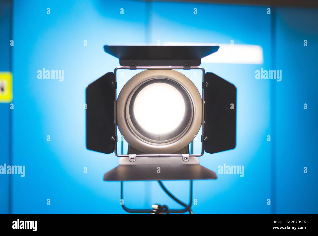 Professional studio spotlight in a TV studio. Lighting equipment for photography or videography. Stock Photo