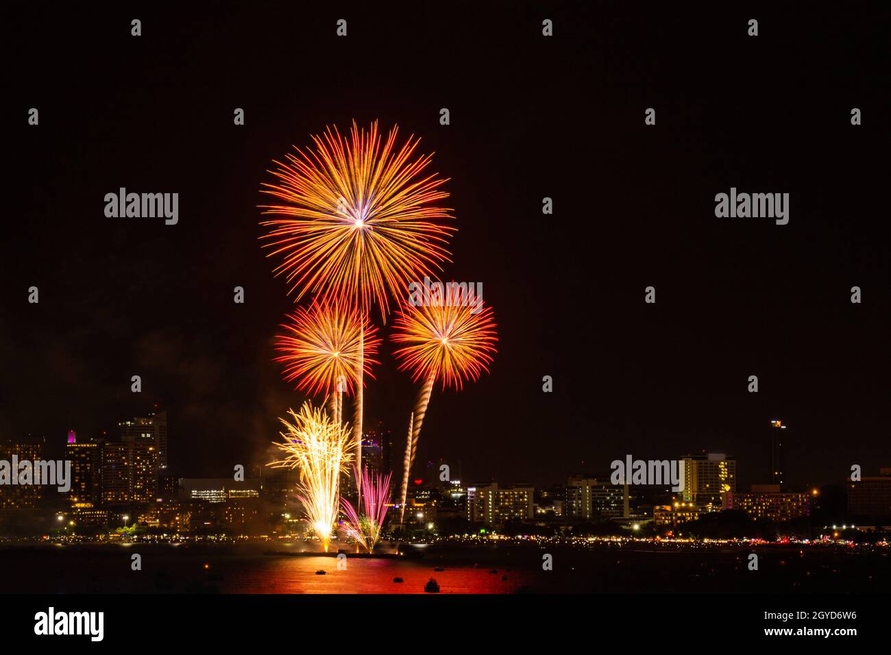 Firework colorful on night city view background for celebration festival. Stock Photo