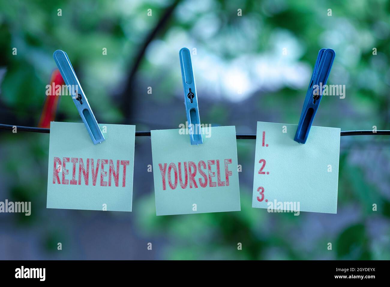 Reinvent Sign Text sign showing Reinvent Yourself, Business concept to do something ...