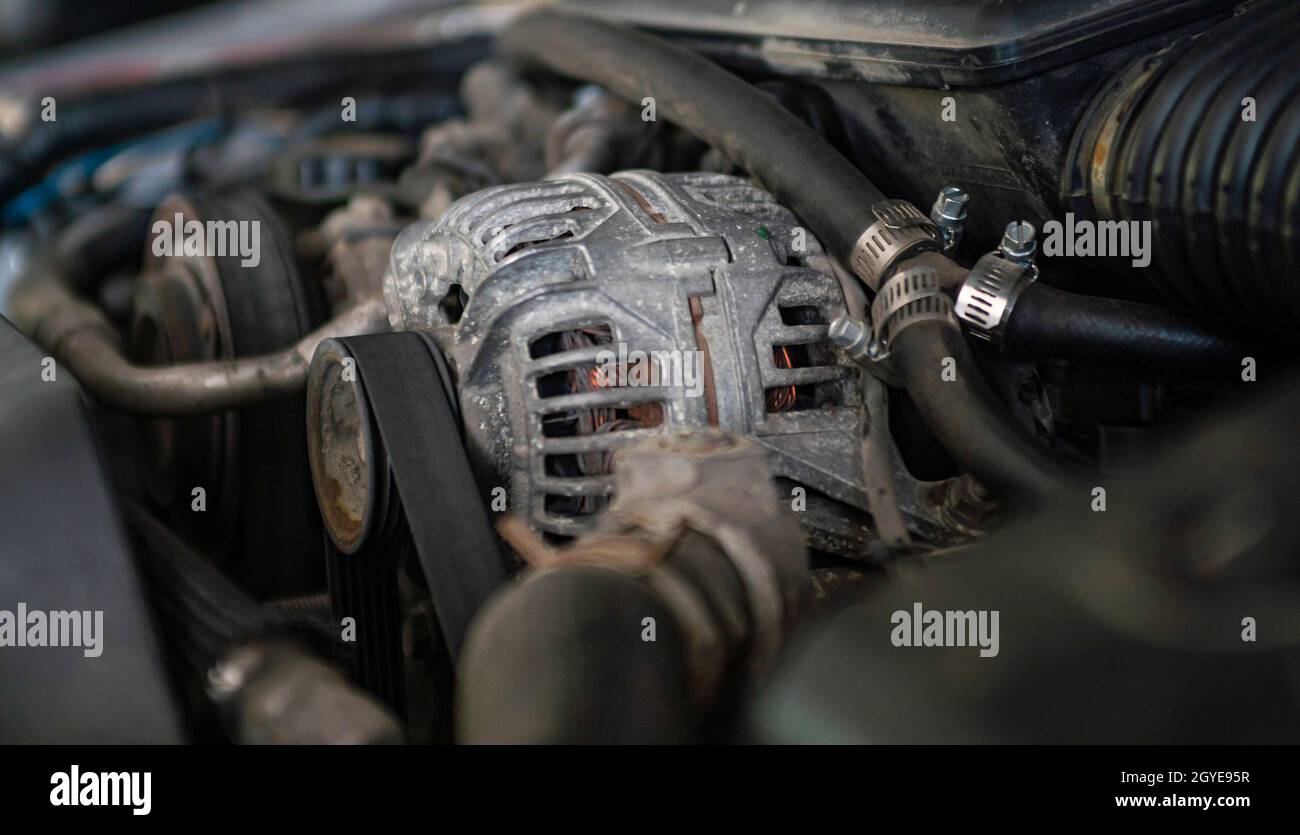 Car engine alternator detail in a mechanical Stock Photo Alamy