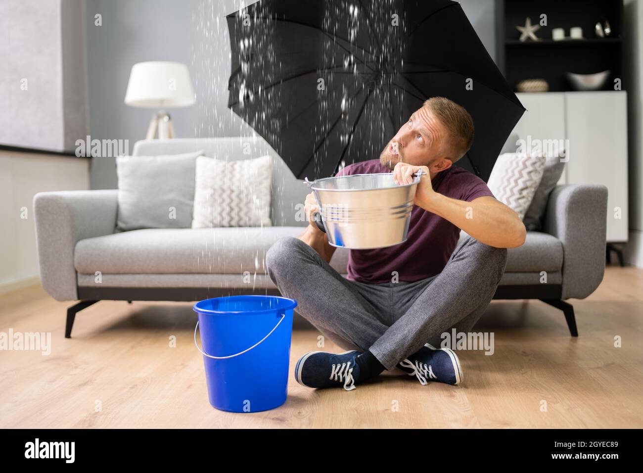 Emergency Leak In House Or Apartment. Water Falling From Ceiling Stock
