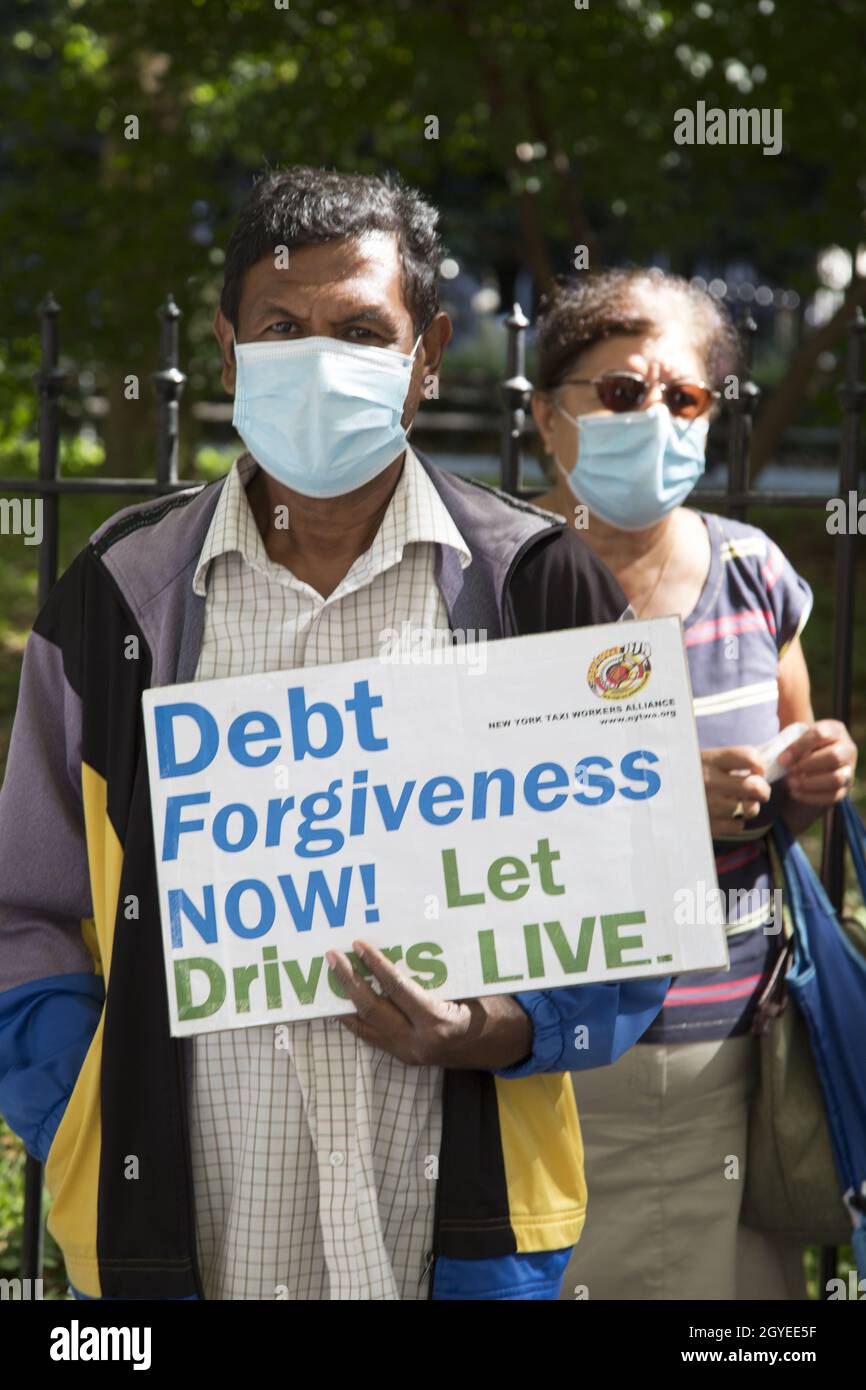 Yellow Cab Taxi Workers Alliance demands justice for drivers in terms of debt relief for expensive medallions for what they consider a city-manufactured crisis on Broadway by City Hall in Manhattan, NYC. Stock Photo